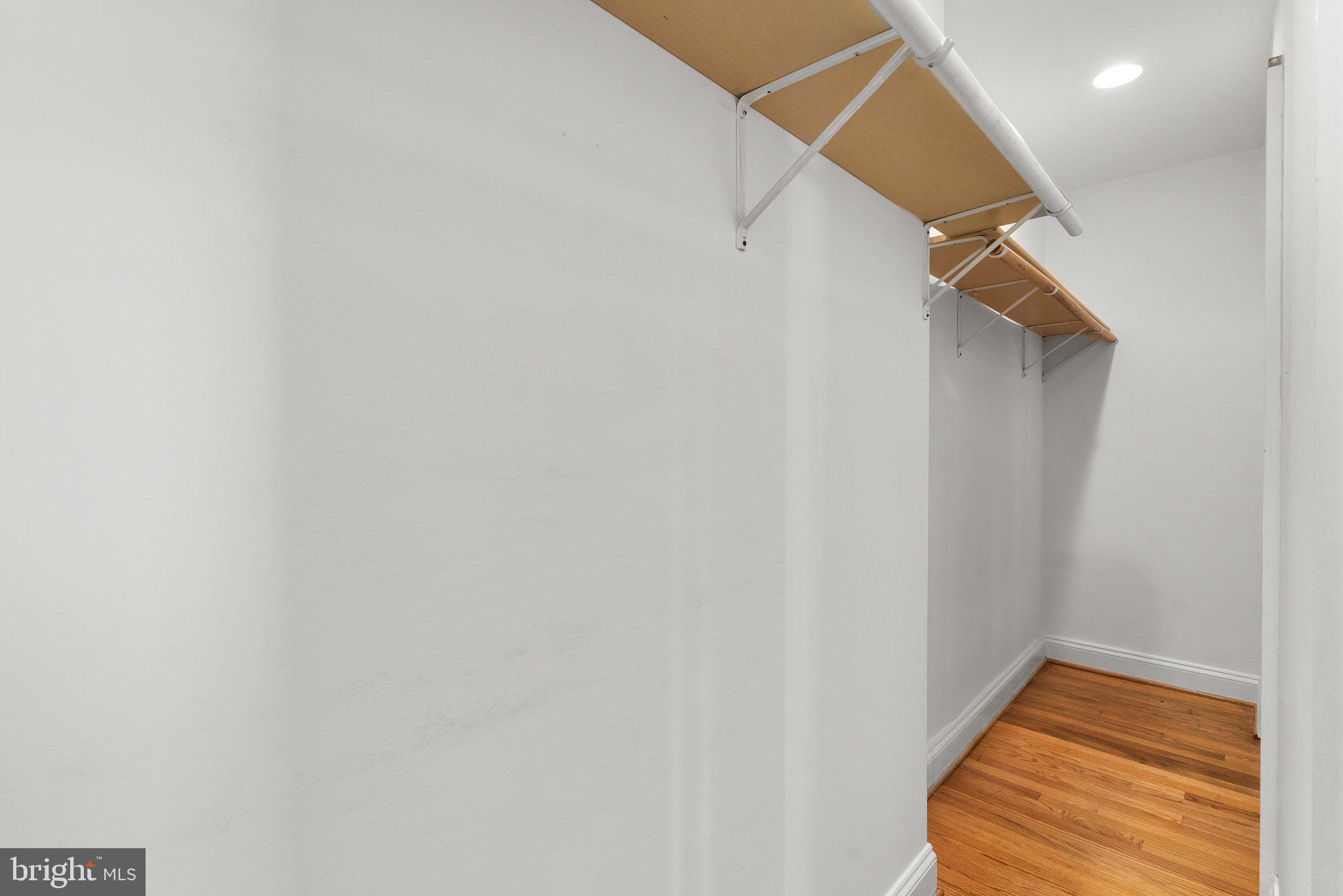 2206 Darrow Street Silver Spring, MD 20902 - Photo 15 of 31 a view of small space with racks on the wall