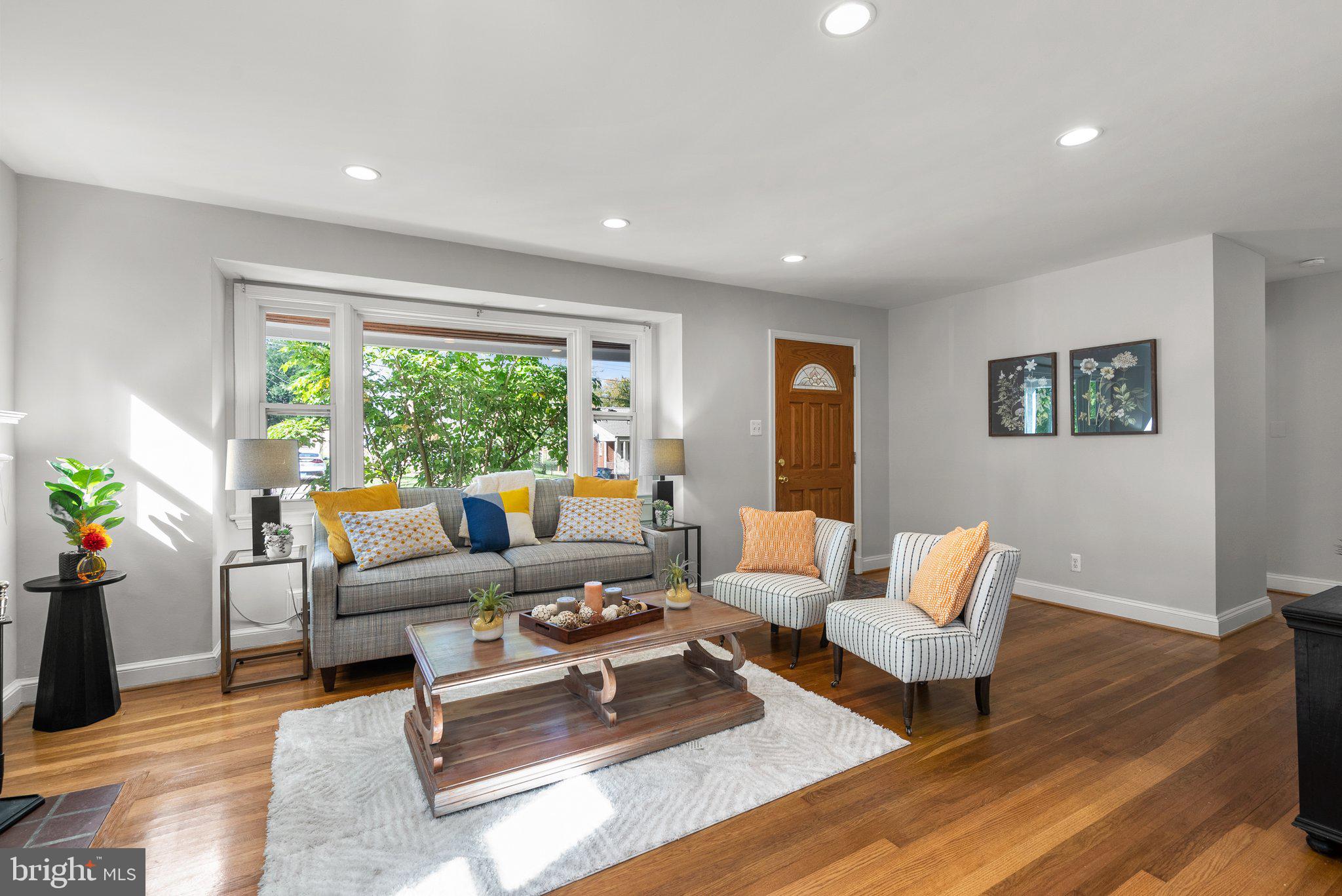 2206 Darrow Street Silver Spring, MD 20902 - Photo 5 of 31 a living room with furniture and a large window
