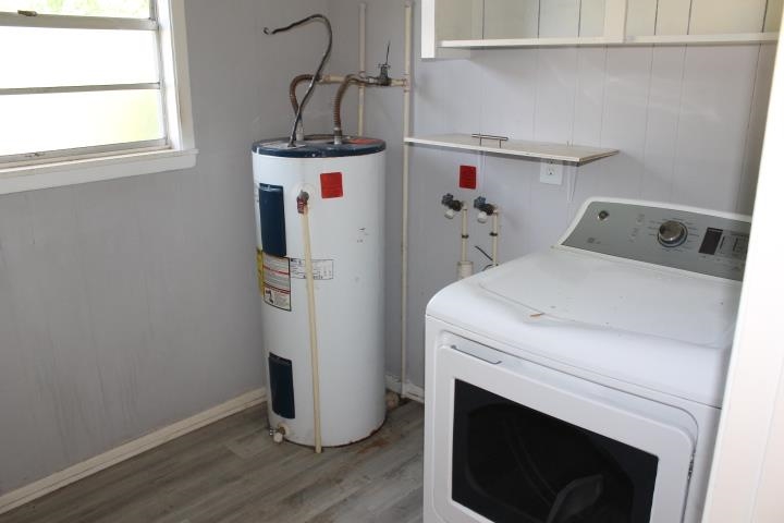875 Woodrow Street Silsbee, TX 77656 - Photo 17 of 30 a room with storage and utility
