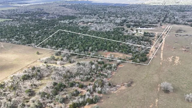 a view of a yard from a balcony