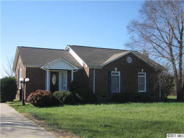 2012 Haigler Baucom Road Monroe, NC 28110 - Photo 1 of 11 a front view of a house with a yard