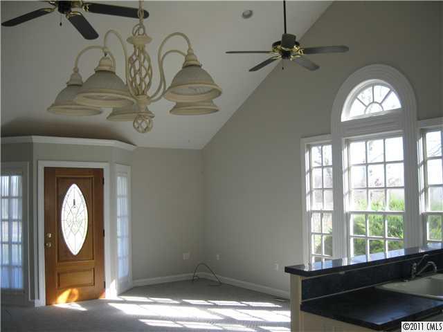2012 Haigler Baucom Road Monroe, NC 28110 - Photo 2 of 11 a view of a livingroom with furniture window wooden floor and a chandelier