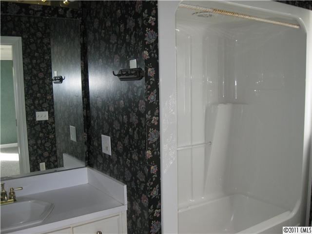 2012 Haigler Baucom Road Monroe, NC 28110 - Photo 6 of 11 a bathroom with a bathtub and shower