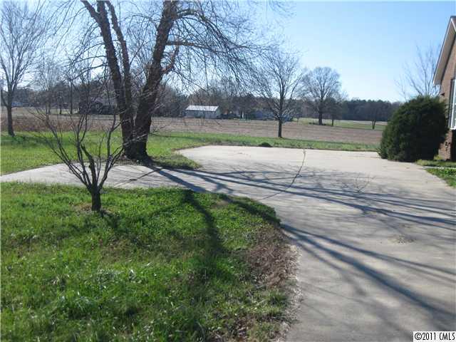 2012 Haigler Baucom Road Monroe, NC 28110 - Photo 10 of 11 a view of a yard with a large tree