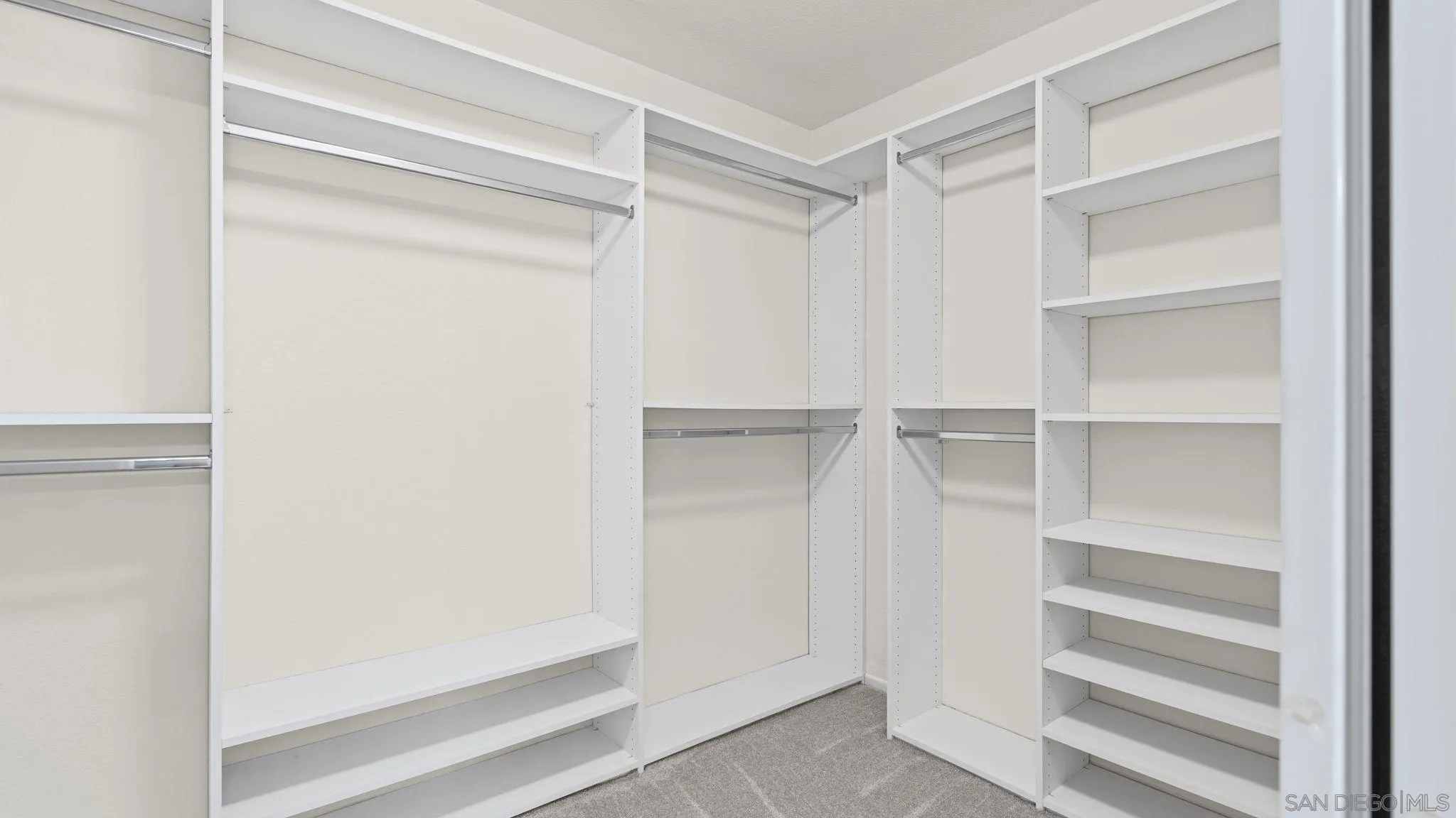1783 Medinah Road San Marcos, CA 92069 - Photo 23 of 39 a view of walk in closet with empty racks
