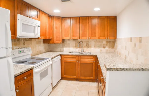 $219,900 | 733 Southeast 1st Way, Unit 206, Deerfield Beach, FL 33441