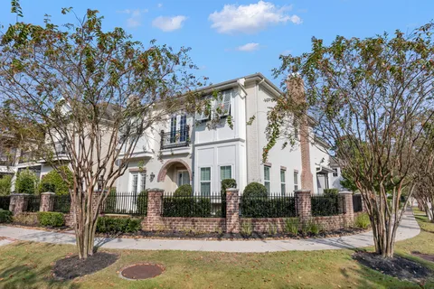 a view of a building with a tree