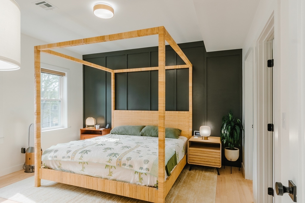 43 Withington Street, Unit 7 Boston, MA 02124 - Photo 14 of 21 a bedroom with a bed and a window