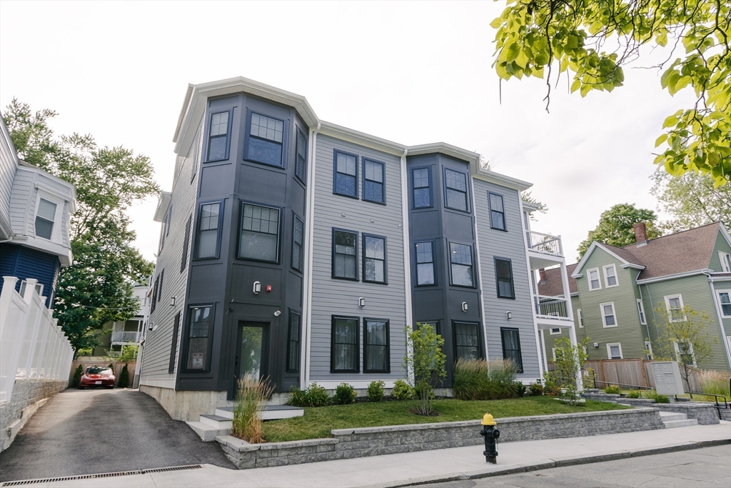 43 Withington Street, Unit 7 Boston, MA 02124 - Photo 19 of 21 a front view of a building