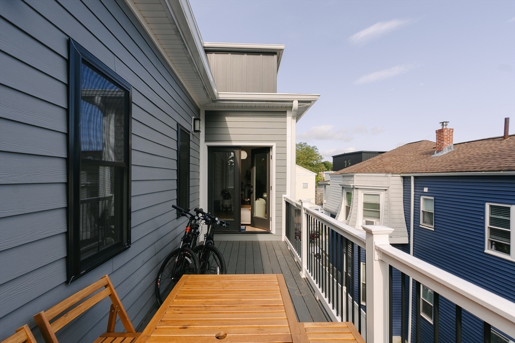 43 Withington Street, Unit 7 Boston, MA 02124 - Photo 20 of 21 a view of a balcony with chairs