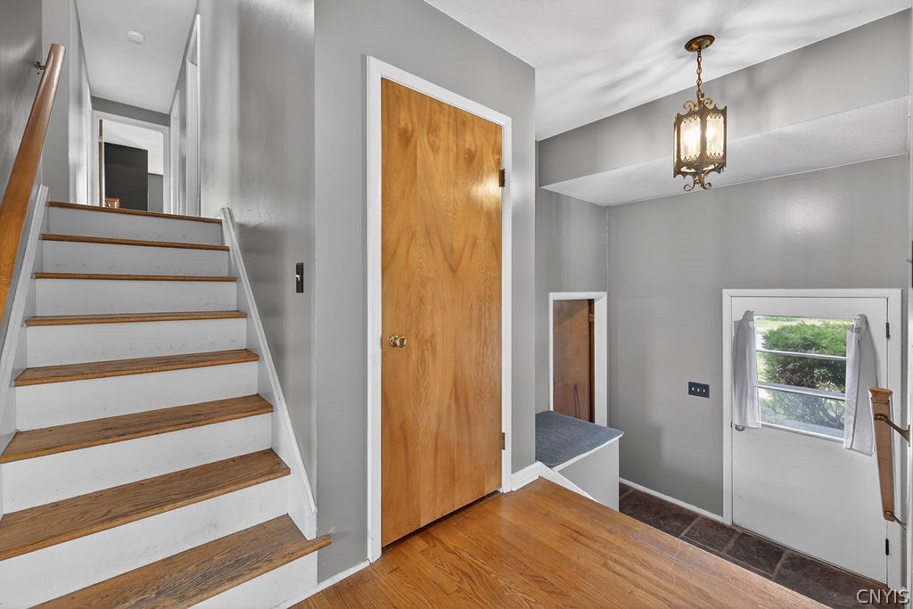 166 Terrace Way Camillus, NY 13031 - Photo 22 of 49 Overlooking Front Entrance/Foyer and stairs leading to 3rd floor and Bedrooms.
