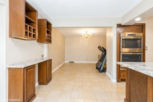 a view of a livingroom with furniture and cabinet