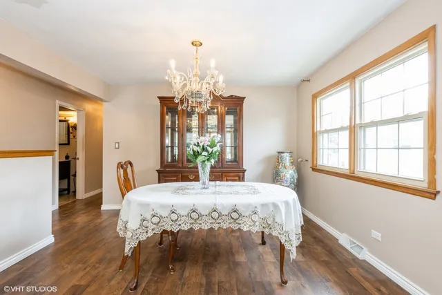 a bedroom with a bed and a table