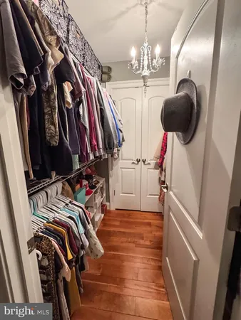 a view of a hallway with dining area