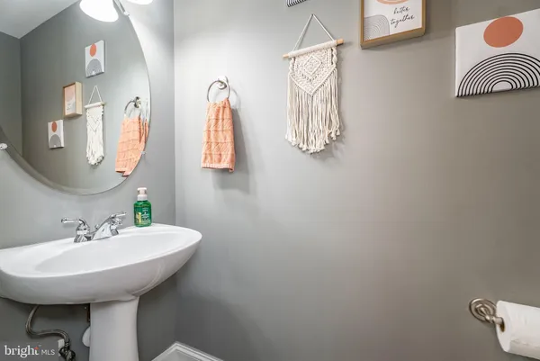 a bedroom with furniture and a chandelier