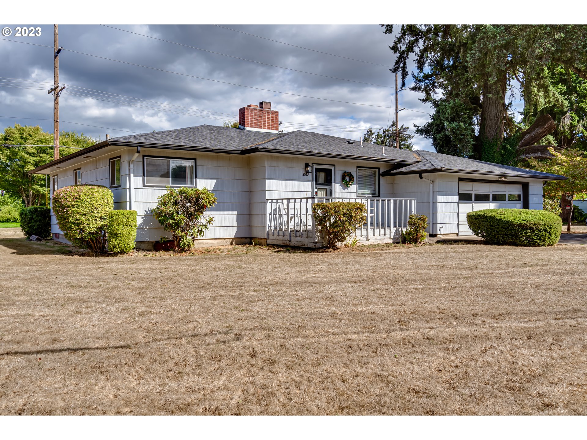 3065 Game Farm Road Springfield, OR 97477 - Photo 1 of 15 a front view of a house with a yard