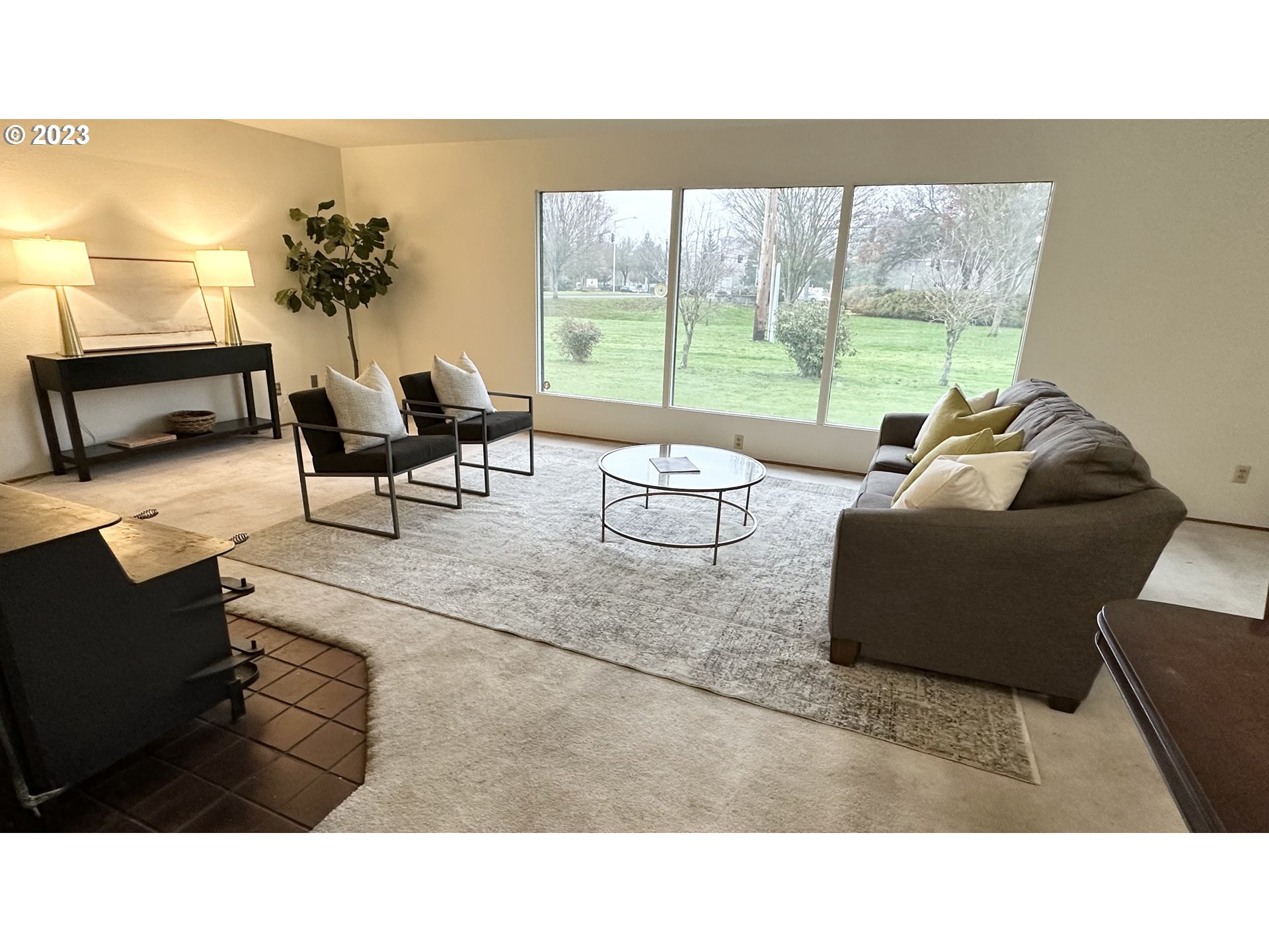 3065 Game Farm Road Springfield, OR 97477 - Photo 3 of 15 a living room with furniture and a large window
