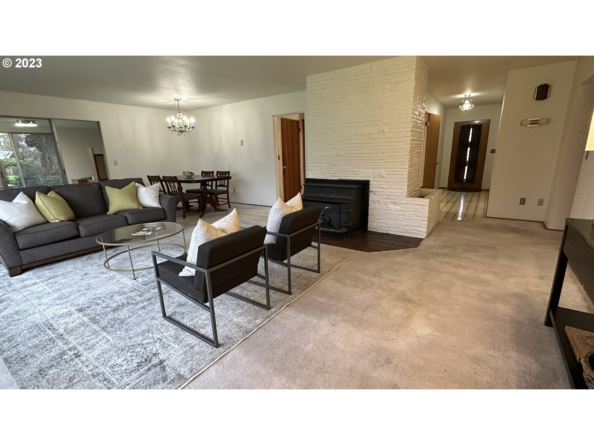3065 Game Farm Road Springfield, OR 97477 - Photo 5 of 15 a living room with furniture and a fireplace