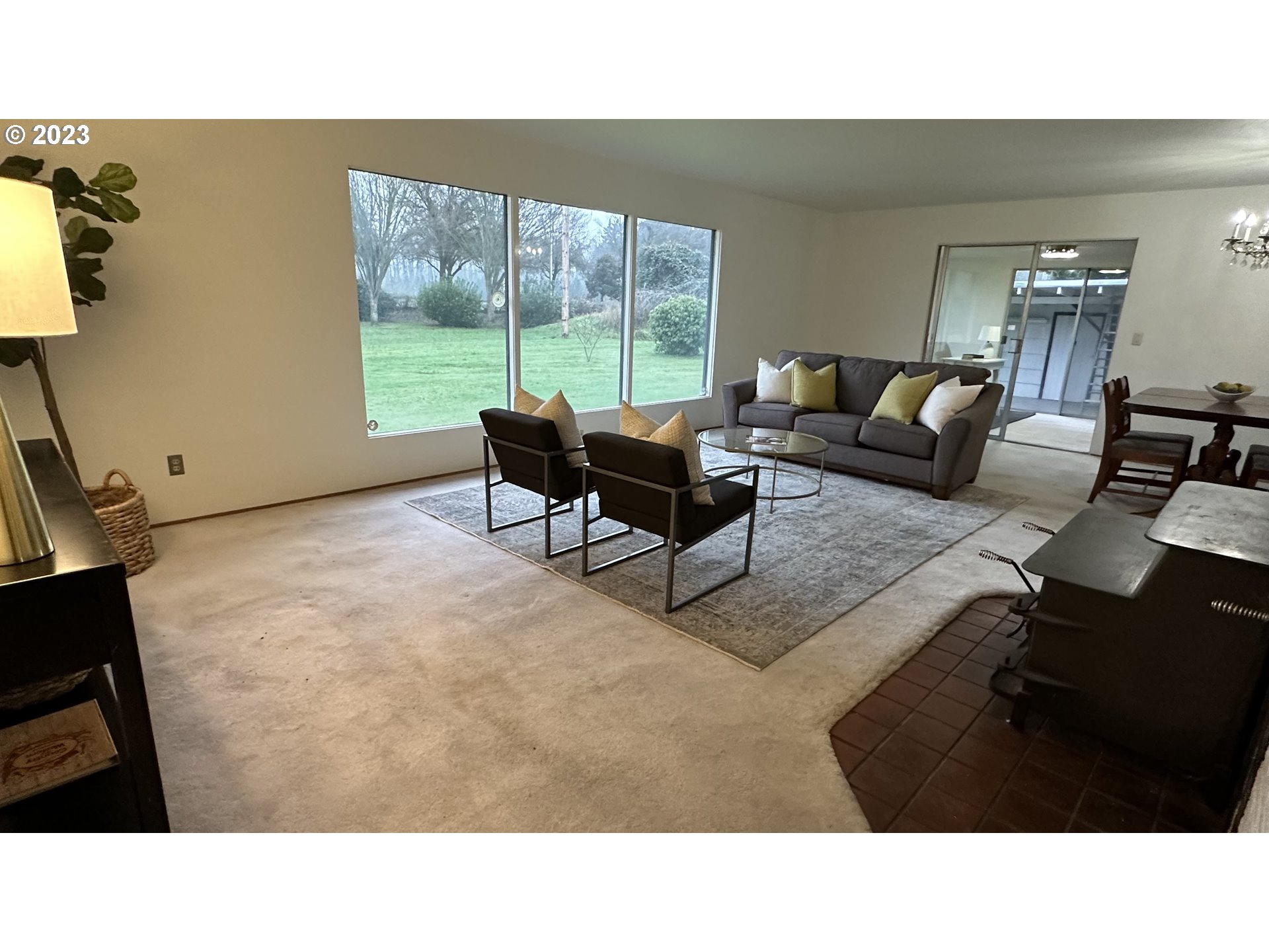 3065 Game Farm Road Springfield, OR 97477 - Photo 6 of 15 a living room with furniture and a window