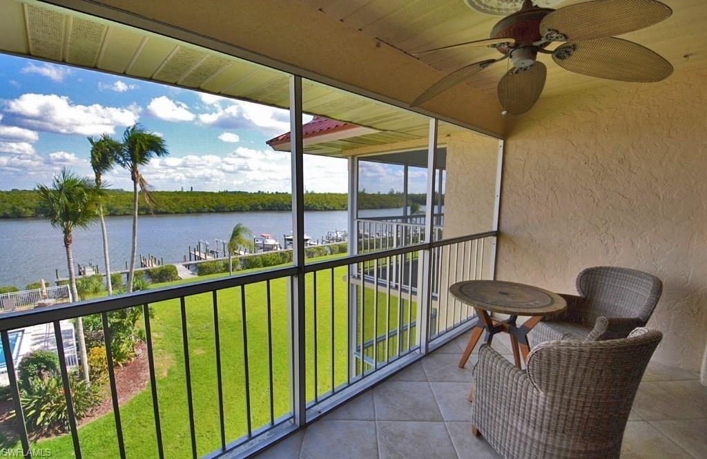 307 Goodlette-Frank Road, Unit 506B Naples, FL 34102 - Photo 18 of 25 a view of a balcony with furniture