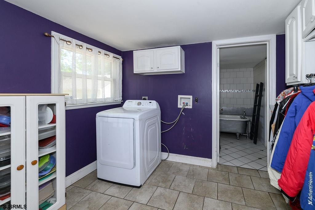 19 South 1st Road Hammonton, NJ 08037 - Photo 27 of 36 a utility room with a washer dryer and a large window