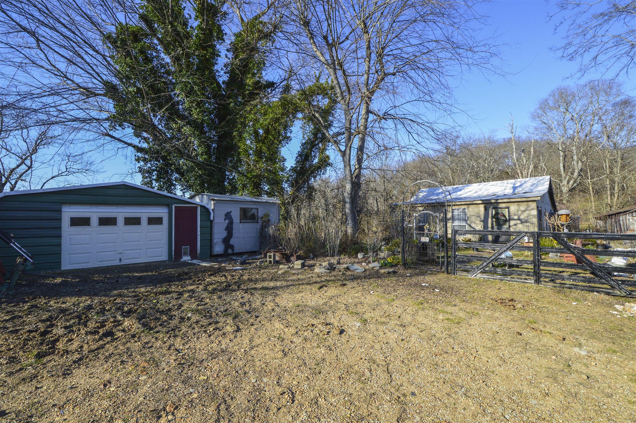 4750 Beech Hill Road Pulaski, TN 38478 - Photo 27 of 30 a view of a house with a yard and large tree