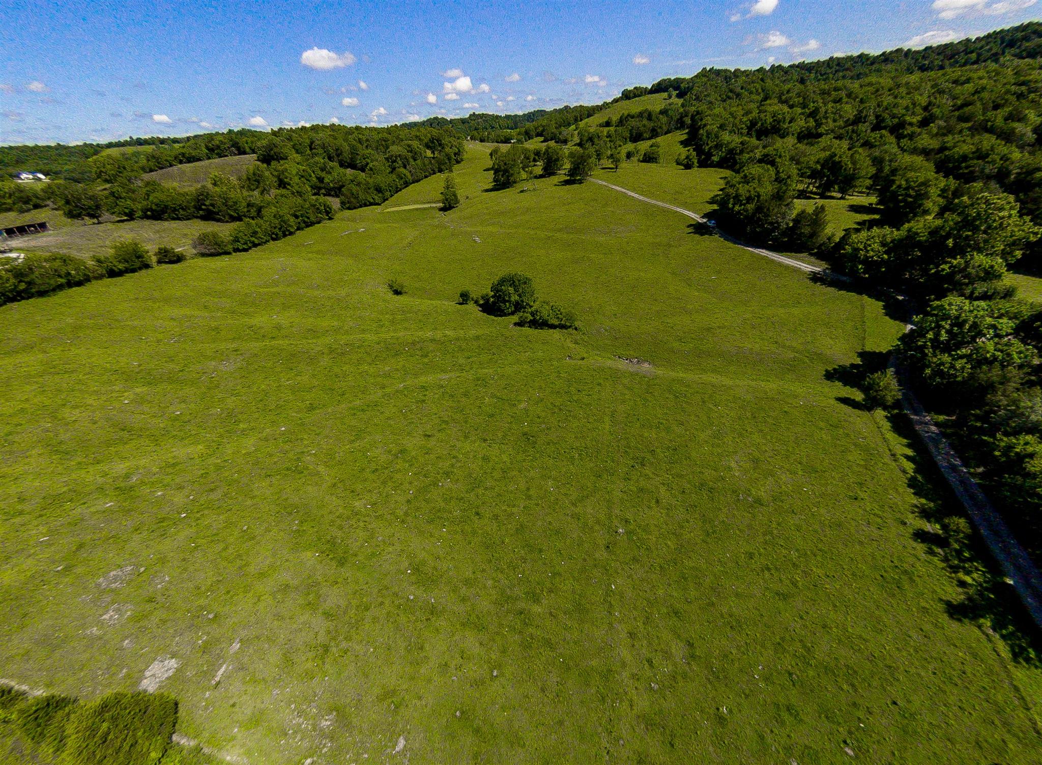 4750 Beech Hill Road Pulaski, TN 38478 - Photo 4 of 30 a view of a golf course with a building