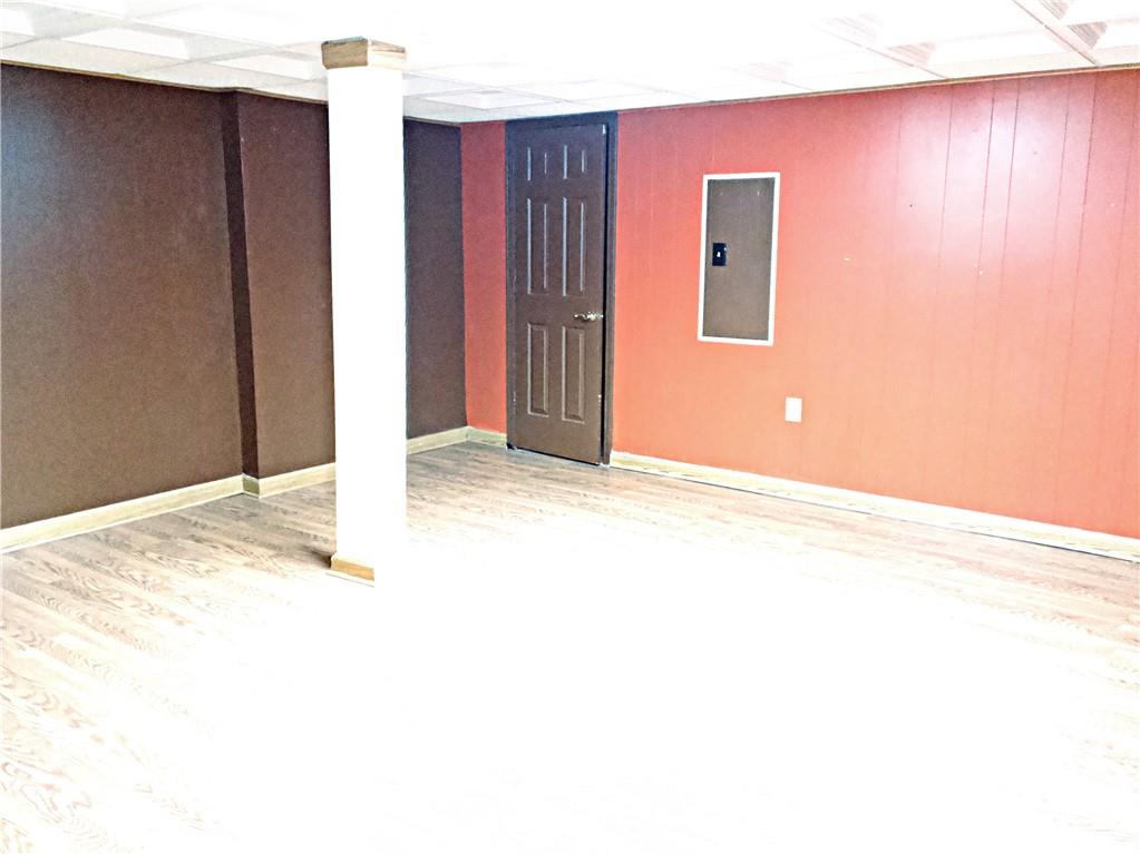 2641 Elbow Road Newton, NC 28658 - Photo 22 of 31 a view of a livingroom with wooden floor and a hallway