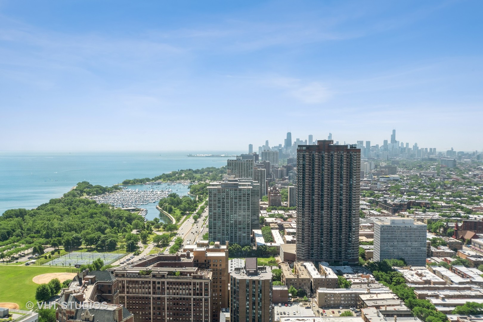 655 West Irving Park Road, Unit 4915 Chicago, IL 60613 - Photo 12 of 17 a view of a city with tall buildings