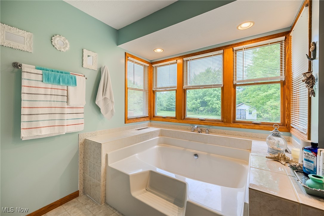 5691 Callahan Road Rome, OH 44085 - Photo 34 of 45 Bathroom featuring a bath and recessed lighting