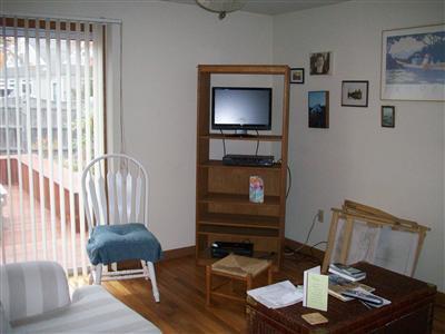 9 Spoondrift Circle Mashpee, MA 02649 - Photo 16 of 21 a living room with furniture and a wooden floor