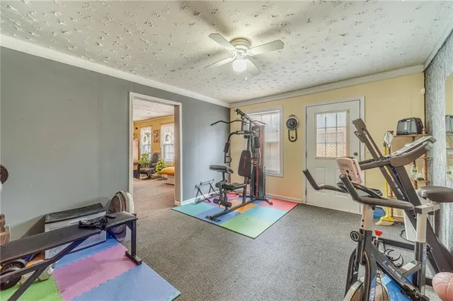 a room with furniture and a chandelier