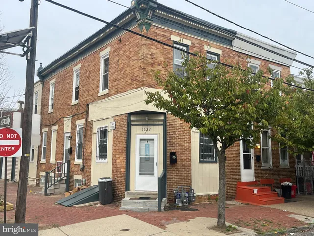a front view of a building with street view