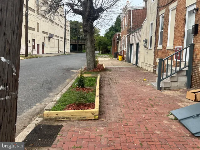 a view of a street with buildings