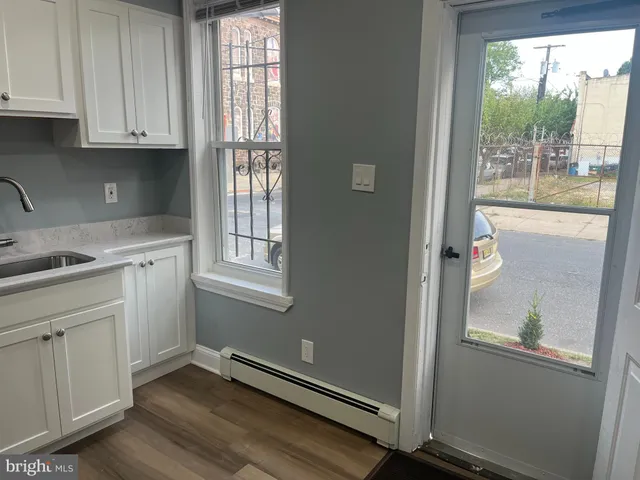 a view of cabinets and window