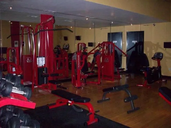 a view of a porch with potted plants