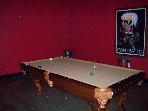 a bed room with gym equipment