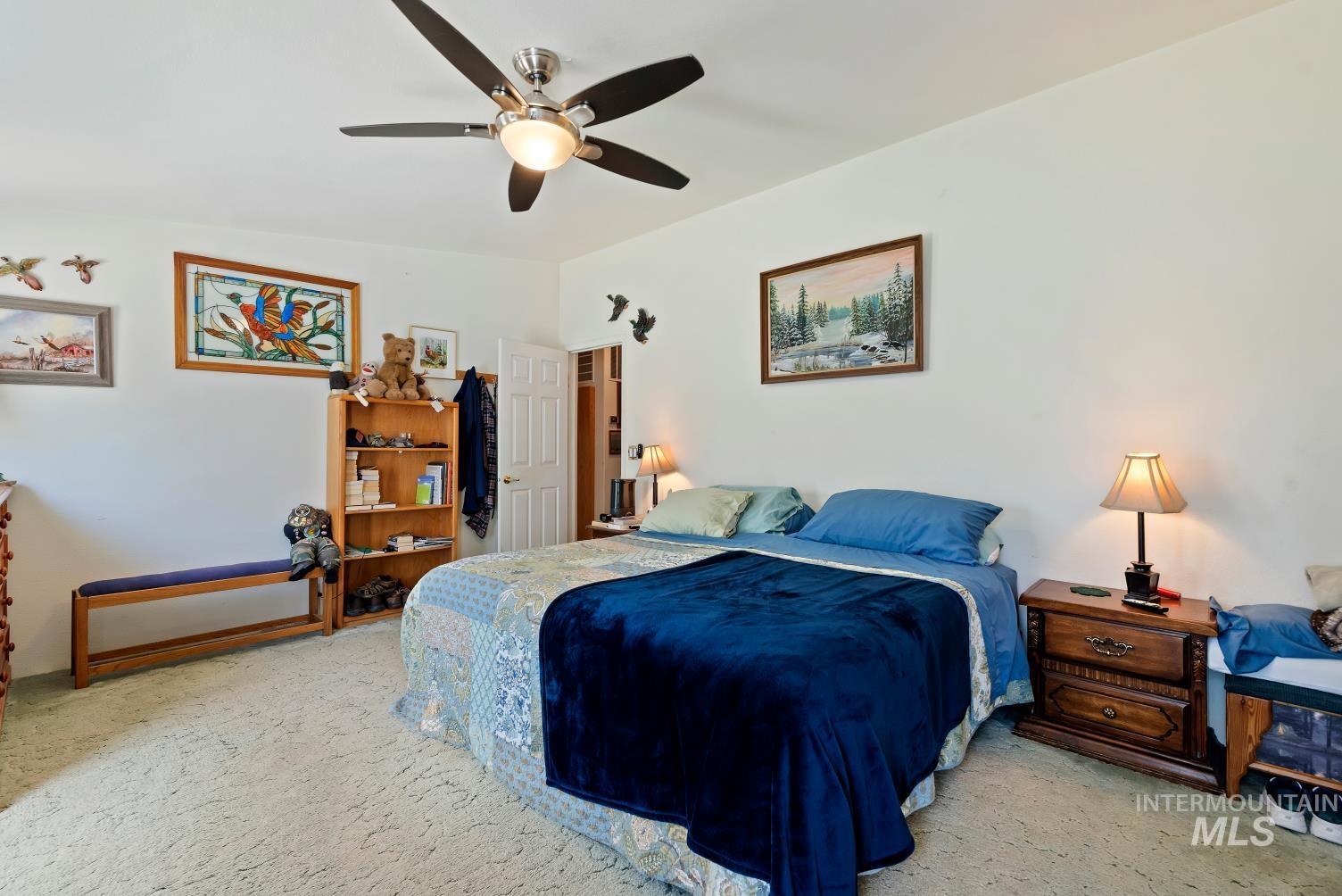 19152 Marsing Road Caldwell, ID 83607 - Photo 26 of 47 Spacious room featuring light-toned walls and plush carpeting