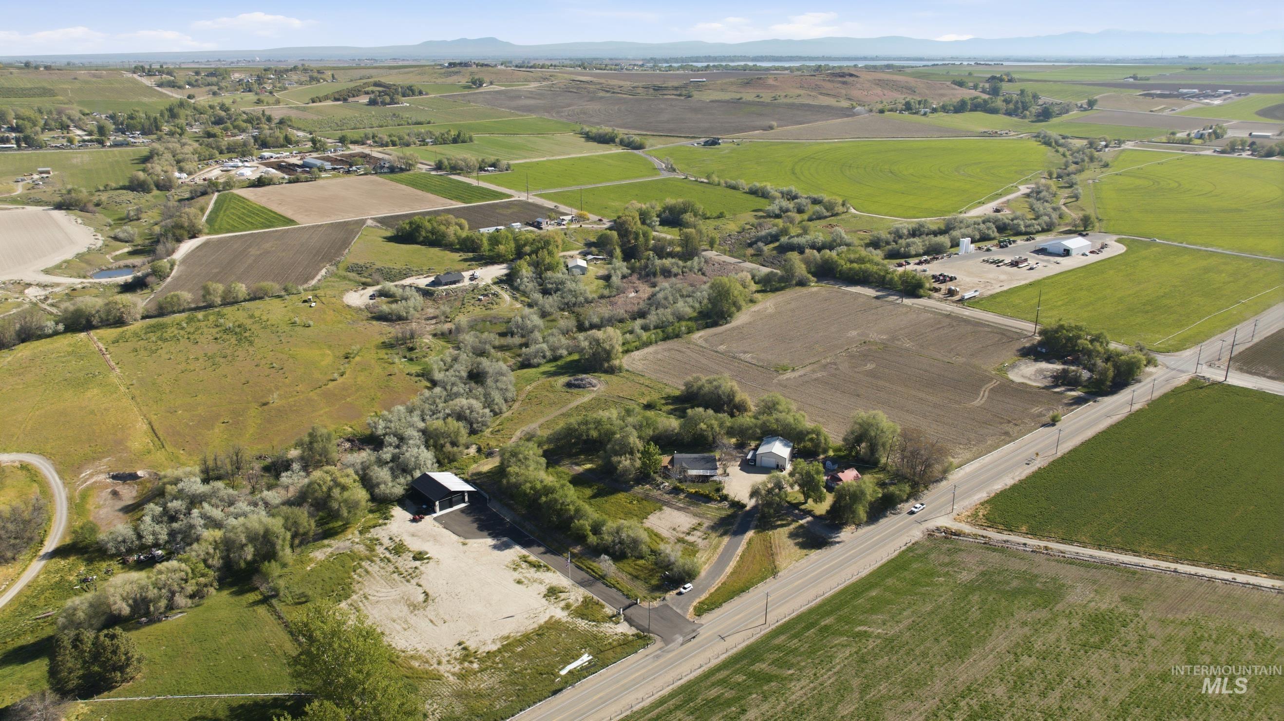 19152 Marsing Road Caldwell, ID 83607 - Photo 44 of 50 Expansive rural property featuring cultivated fields and undeveloped land