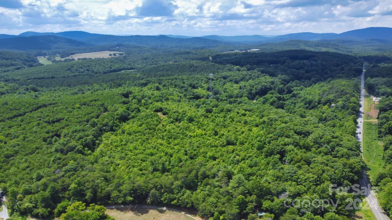 0 Hunt Road Bostic, NC 28018 - Photo 13 of 14 a view of a lush green forest with trees in the background