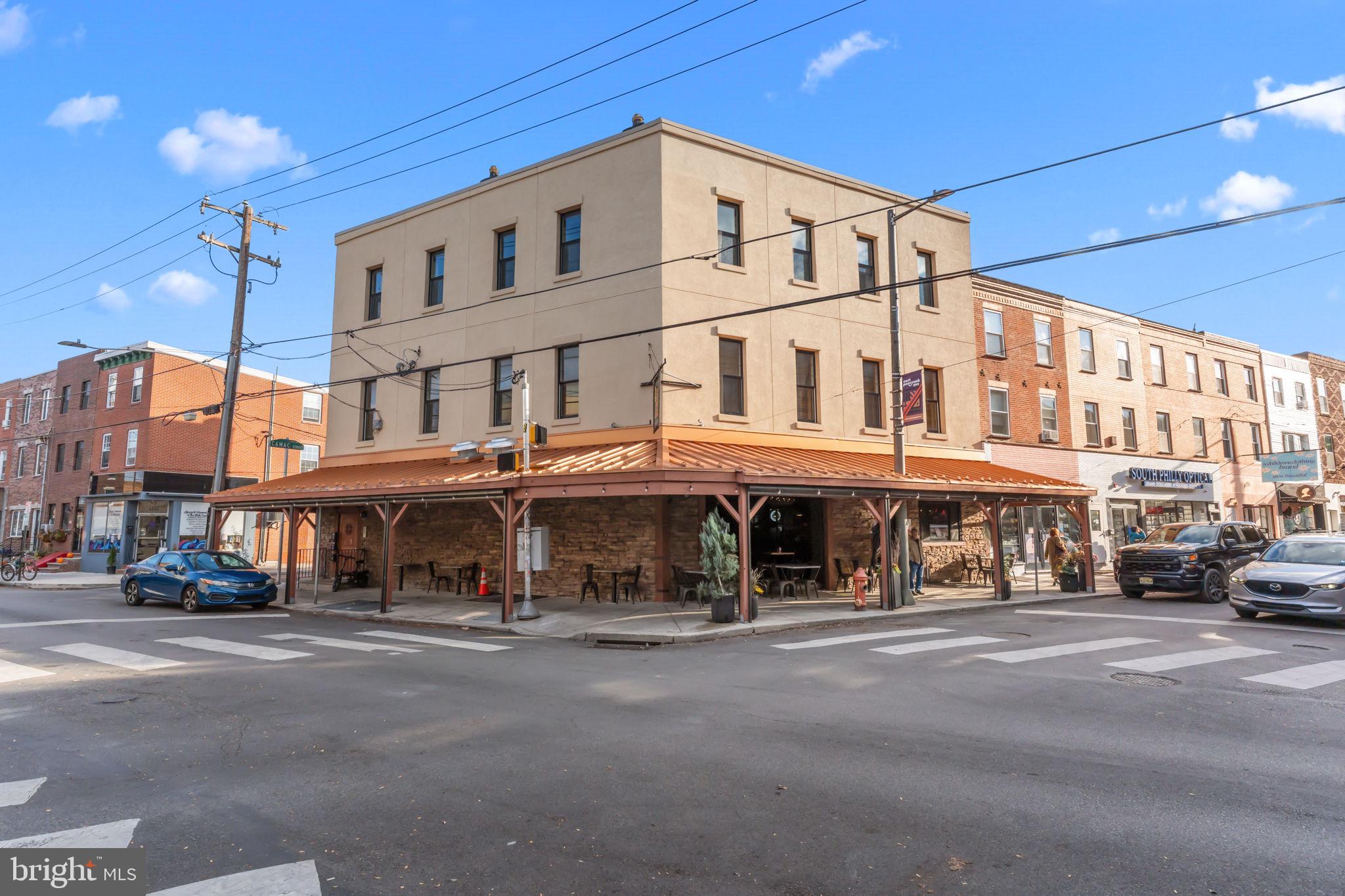 1801 East Passyunk Avenue, Unit B Philadelphia, PA 19148 - Photo 16 of 16 a front view of a building with street