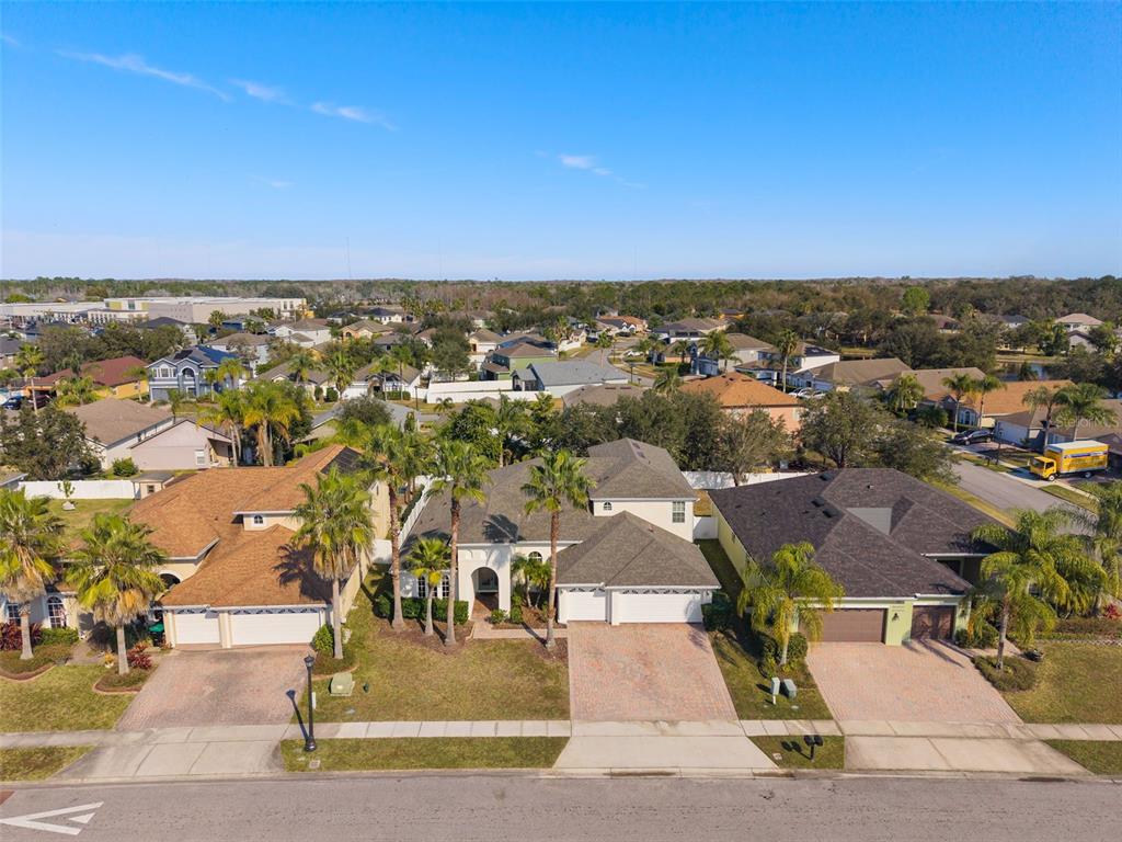 857 Timber Isle Drive Orlando, FL 32828 - Photo 44 of 54 an aerial view of residential houses with outdoor space