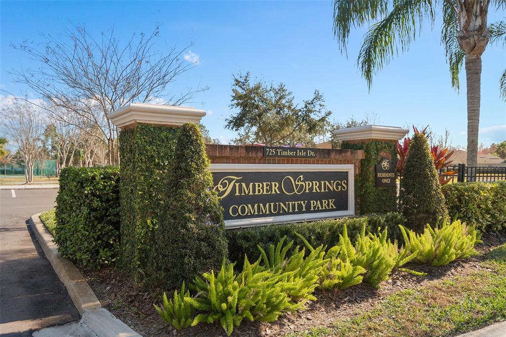 857 Timber Isle Drive Orlando, FL 32828 - Photo 47 of 54 a view of sign board with flower around