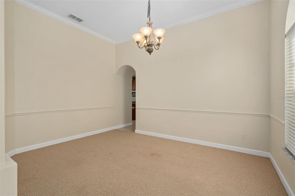 857 Timber Isle Drive Orlando, FL 32828 - Photo 7 of 54 a view of a small space with racks on the wall