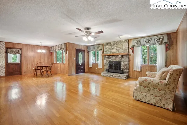 a kitchen with stainless steel appliances granite countertop wooden cabinets a sink and dishwasher