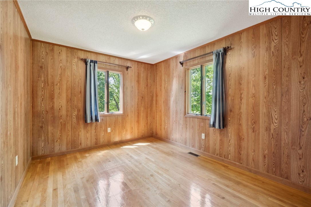 2076 Jay Clark Road Morganton, NC 28655 - Photo 29 of 36 a view of an empty room with a window and a bathroom
