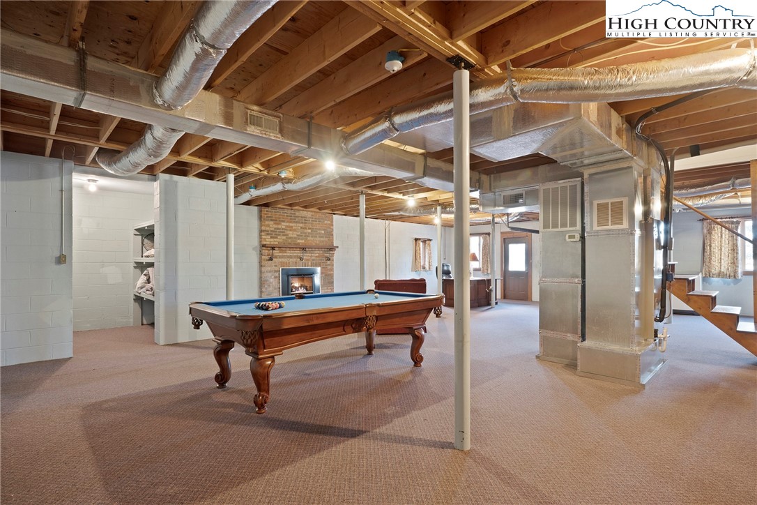 2076 Jay Clark Road Morganton, NC 28655 - Photo 32 of 36 a outdoor space with pool tables and glass windows