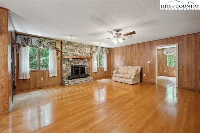 a view of a house with a yard and garage