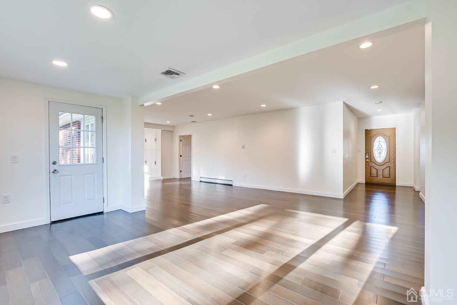 38 New Brooklyn Road Edison, NJ 08817 - Photo 15 of 39 a view of a livingroom with wooden floor