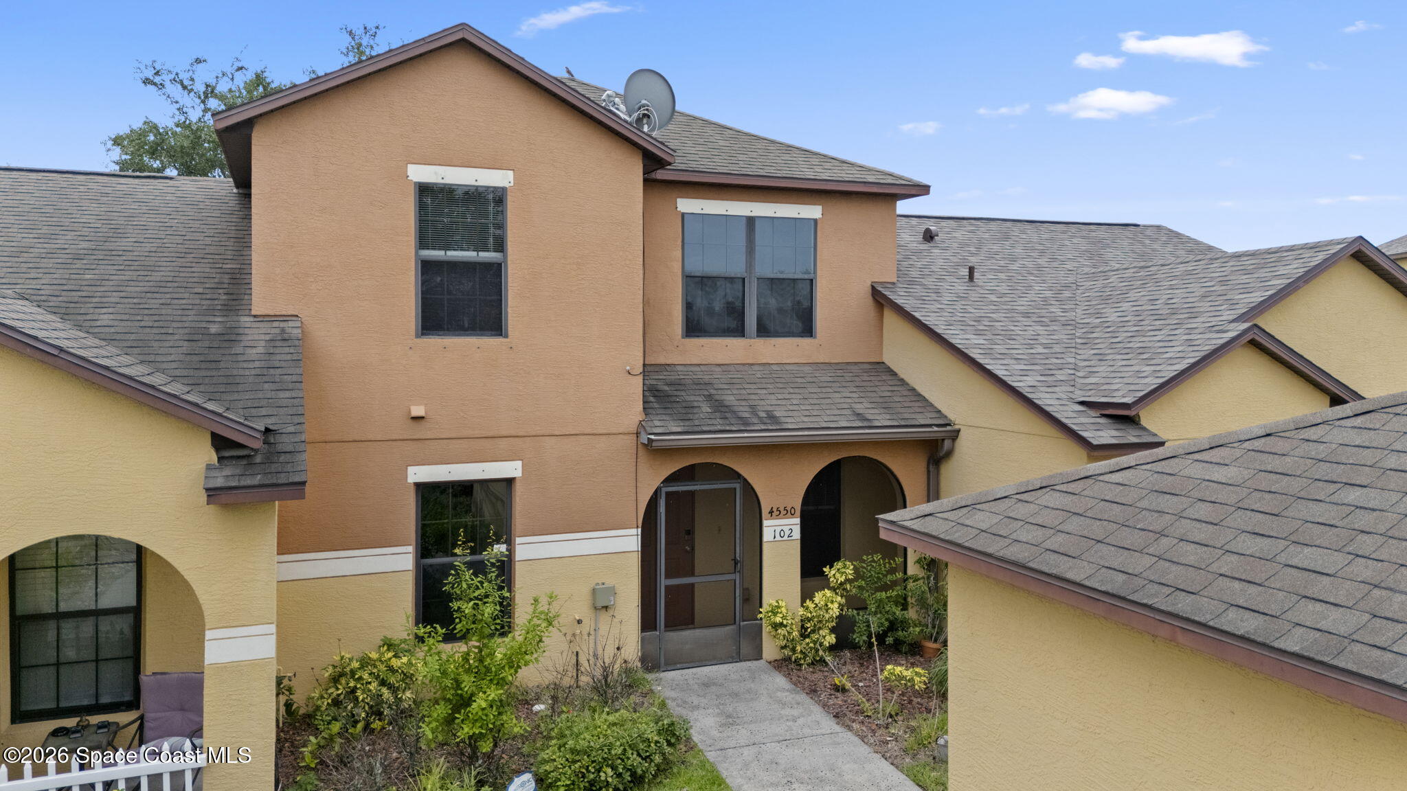 4550 Radiant Way, Unit 102 Melbourne, FL 32901 - Photo 1 of 42 Front